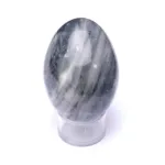 mineral de calcita bandeada pulido en forma de huevo