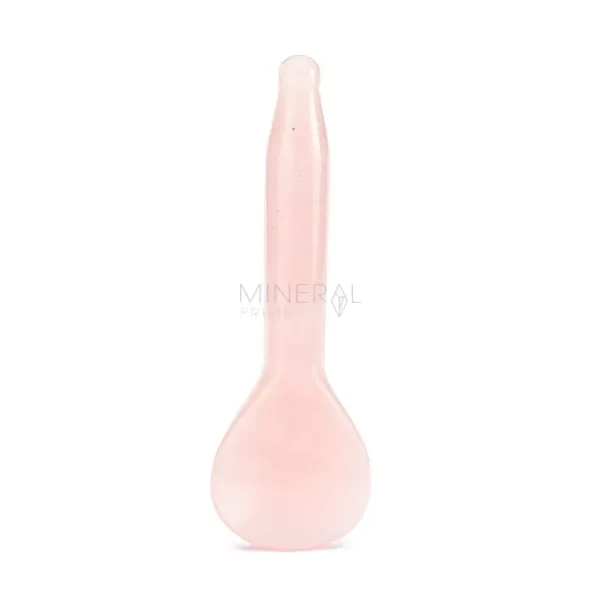 gua sha de cuarzo rosa con forma de cuchara