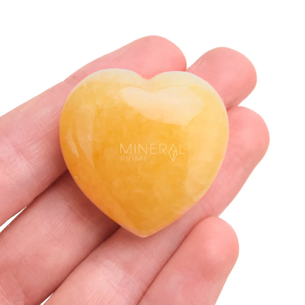 piedra corazon de calcita naranja